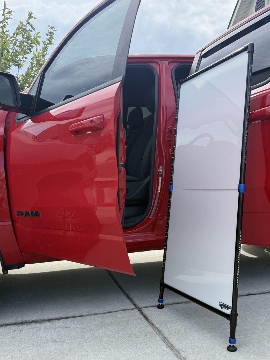 Peel board leaned against a truck door
